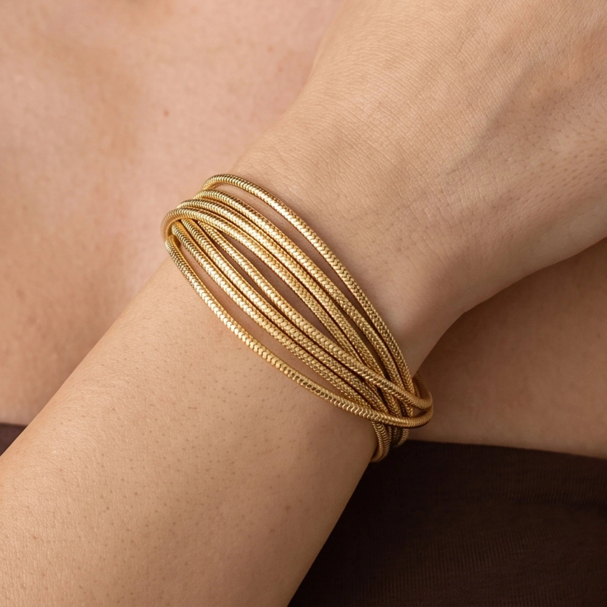 Mehrstrang-Armband mit Omega-Tubogas-Geflecht, 18-karätig vergoldet