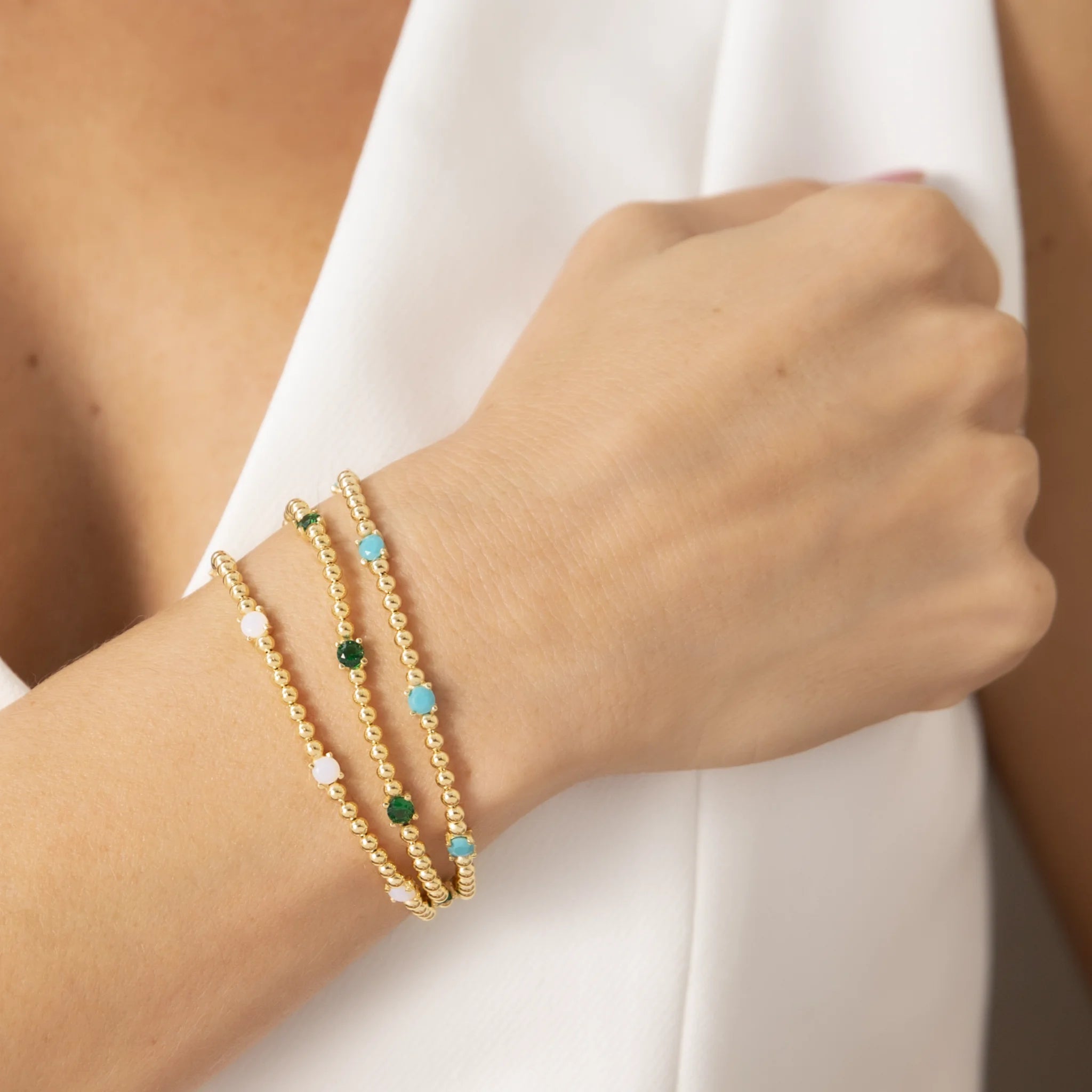 Set 2 Armbänder aus 925er Silber, vergoldet mit 18kt Gelbgold, mit glänzenden Perlen und Cubic Zirkonia