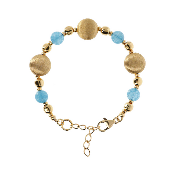 Bracelet avec élément en satin de sphères dorées et pierre naturelle de quartz