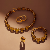 Halskette mit braunem Quarz-Naturstein und gehämmerten Kugeln aus 925er Silber 
