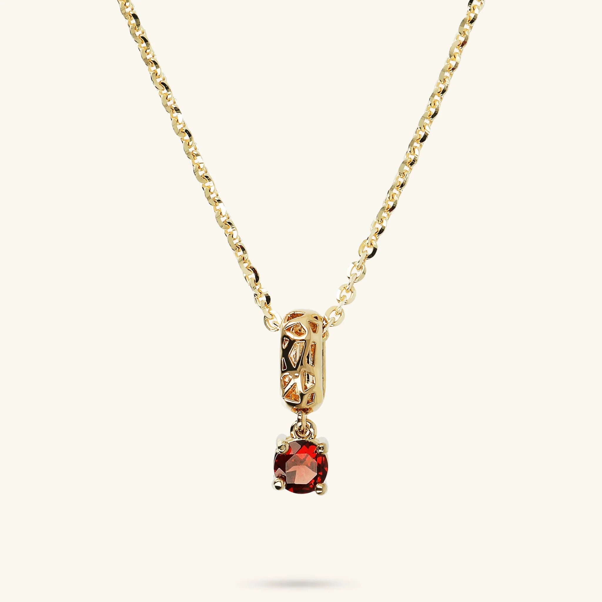 Necklace With Openwork Pendant and Red Garnet