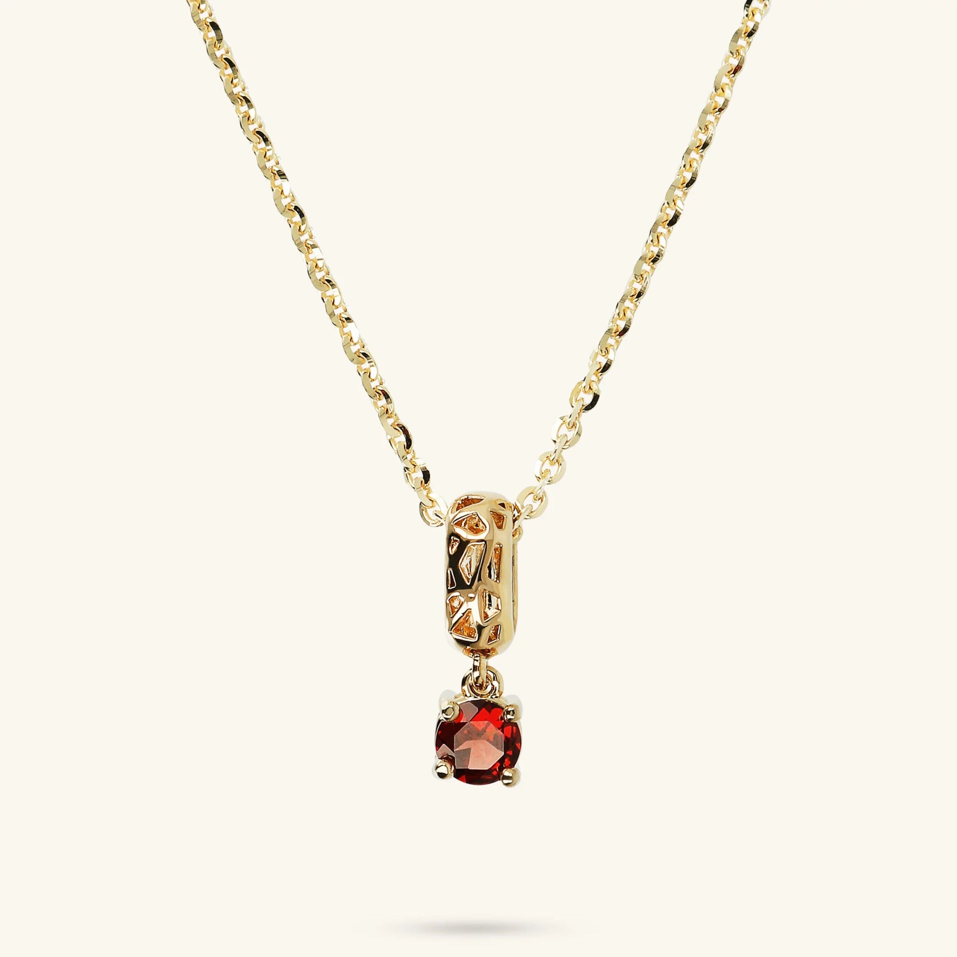 Necklace With Openwork Pendant and Red Garnet