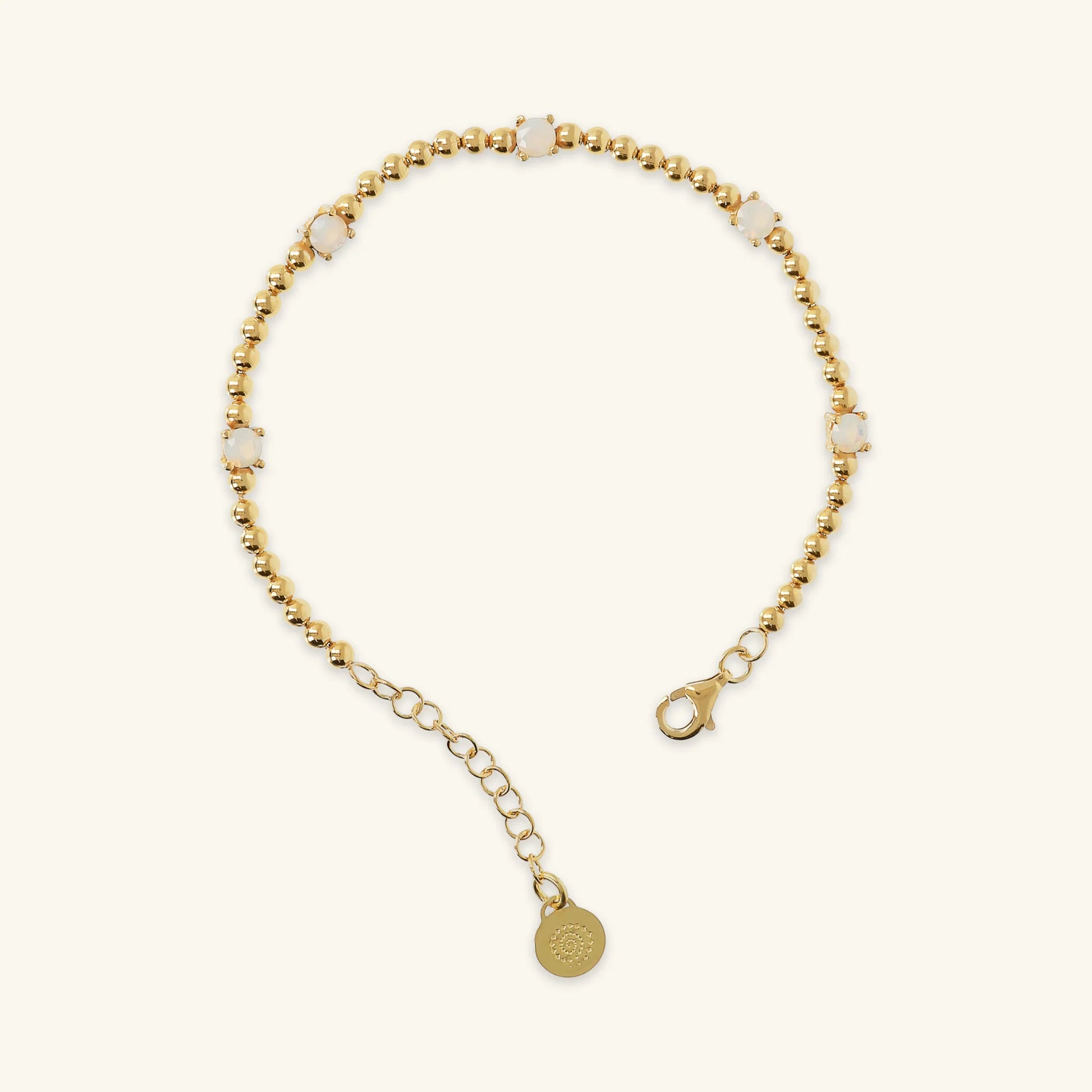 Armband aus 925er Silber, vergoldet mit 18 Karat Gelbgold, mit kleinen Kugeln und Lichtpunkten aus Zirkonia
