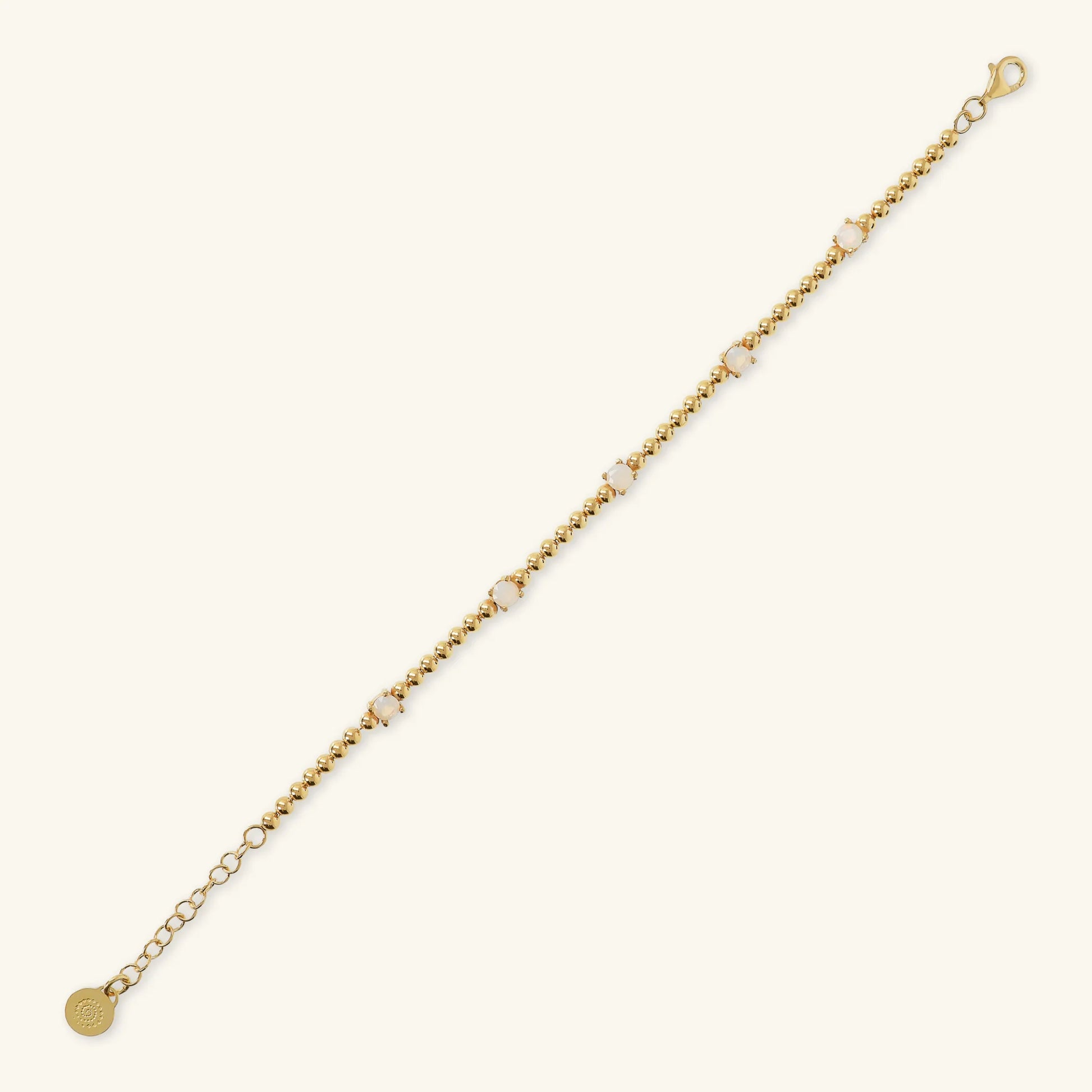 Armband aus 925er Silber, vergoldet mit 18 Karat Gelbgold, mit kleinen Kugeln und Lichtpunkten aus Zirkonia