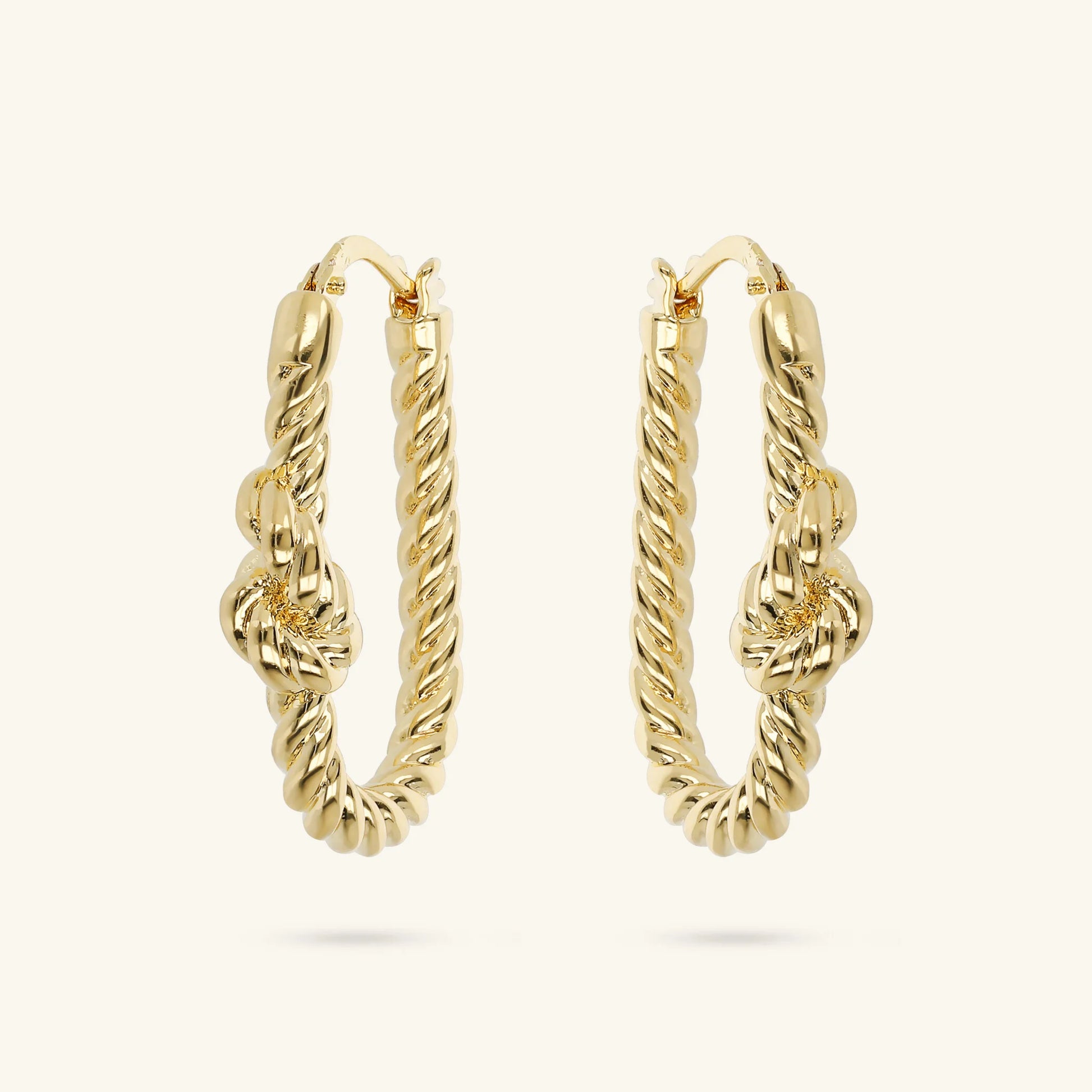 Boucles d'oreilles créoles ovales avec nœud